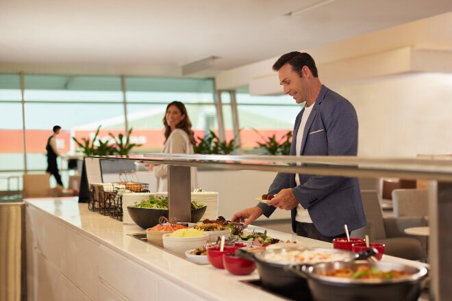 Qantas club man at buffet