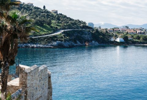 Ocean Harbour at Kusadasi Turkey with views of the port town and blue skies