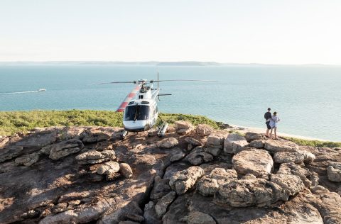 A helicopter perched in the Kimberley on a True North cruise