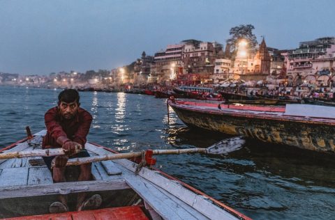 Man on a boat in Varansasi