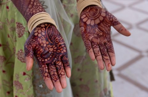 Mehndi on a woman's hands in Varanasi