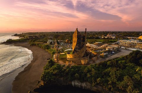 Sunset view of the THK Tower and Luna Beach Club in Nuanu, Bali