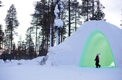 Exploring a snow igloo in Finland