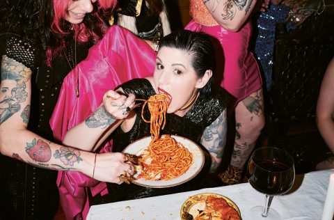 Portrait of chef Shannon Martinez trying  spaghetti pomodoro made from her cookbook Vegan Italian Food